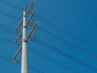 Electricity poles(New design) and wires on blue color background.