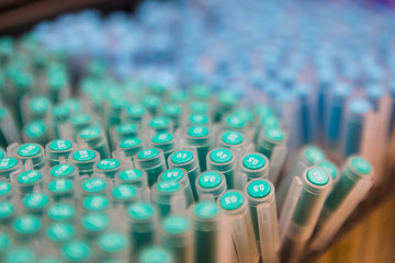 Close up shot of pastel pens, background.