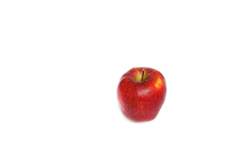 red apple ripe fruit and drip water on a white background 