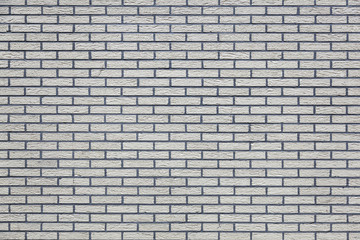 horizontal part of grey painted brick wall