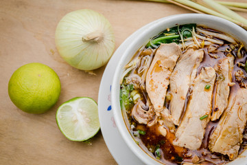 noodle duck with lime and onion on table