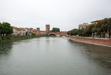 Adige River and Ponte Pietra in Verona . Italy