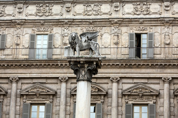 Fototapeta na wymiar The Lion of Saint Mark's symbolizes the city's close ties with Venice. Verona - Piazza delle Erbe. Italy