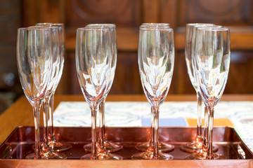 christal champagne flute in line on a tray