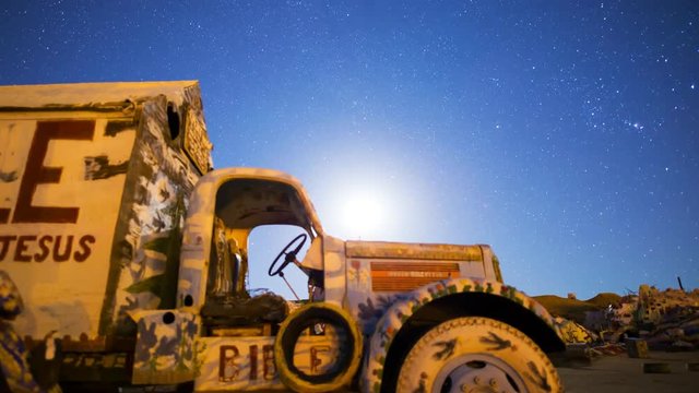 MoCo Astro Timelapse of Moonrise over Painted Landscape in Slab City -Zoom In-