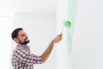 Man painting walls