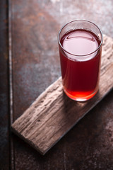 Cranberry drink in a glass on the tabie