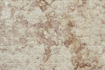Texture de fond de mur de granit brun