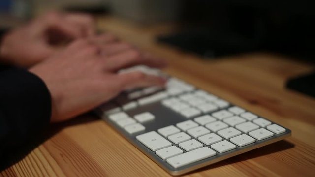 Businessman Close up hands typing on Keyboard, computer spanish keyboard-Dan