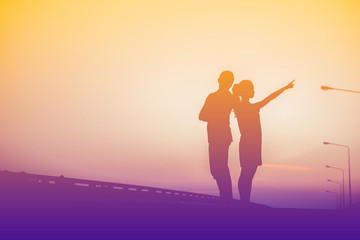 Fototapeta premium Silhouette couples in love the sky.