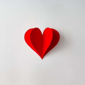 Paper heart shape decoration on white background. Love cocnept. Flat lay.