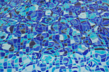 blue ripples in swimming pool, abstract pool water