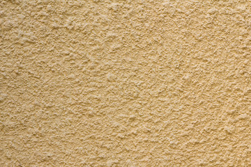 yellow cement wall, yellow rough concrete panel