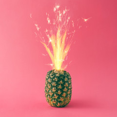 Pineapple with party cake sparkles. Minimal food concept.