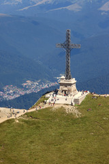 Bucegi Mountains, ROMANIA - AUGUST 14, 2016: Heroes' Cross on Caraiman Peak. The Heroes' Cross is a...