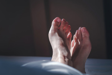 Fototapeta premium Morning Step Female Foot Sleep Relax Concept