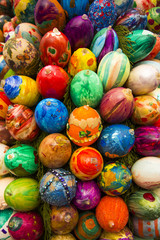 Fototapeta na wymiar Easter fountain. Osterbrunnen. Traditional german easter eggs outdoor decoration. 