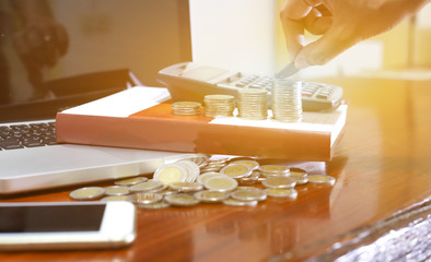 Business concept.Money, Financial, Business Growth concept, Business man's hand put money coins to stack of coins , selective focus.