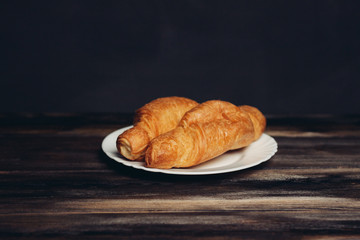two croissants on a plate
