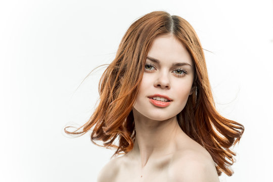 happy woman, red hair, light background