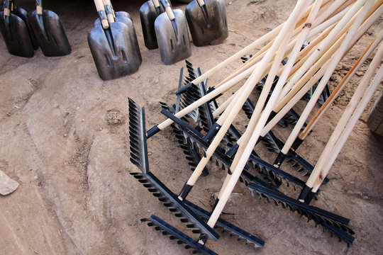 New rakes and square-point shovels prepared for garbage cleaning