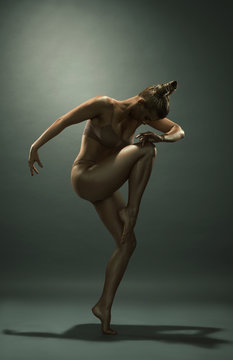 Gold Skin Woman Dancing In Studio