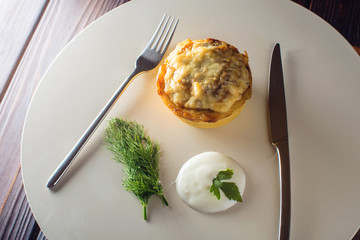 Julienne with chicken and mushrooms served with sour cream, parsley