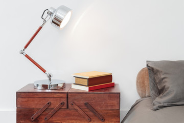 Retro Style Table With Lamp And Books