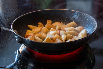 Cooking home fries.