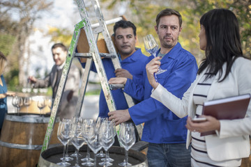 Sales people preparing wine selling event at wine estate
