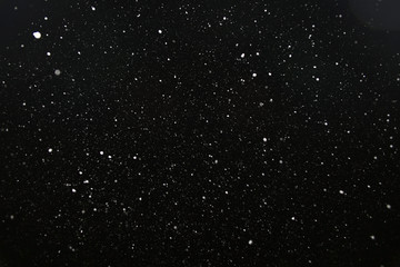 snow on a black background texture overlay bokeh highlights