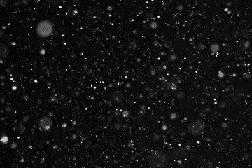 snow on a black background texture overlay bokeh highlights