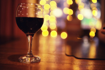 Serving a glass of red wine in a restaurant