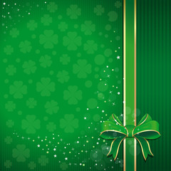Green festive background with ribbon, bow and leafed clover for St. Patrick's Day. St. Patrick's Day background with free space for text. Template for creating flyers, leaflets, banners, posters