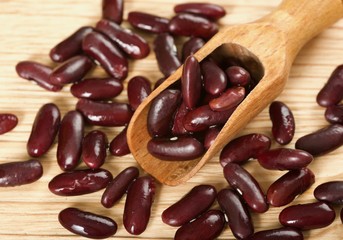 red beans on a wooden background