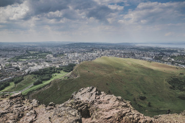 The view from Arthur`s Seat in Edinburgh on the skyline and the North Sea.