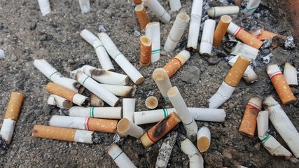 closeup Cigarette butts, Cigarette butts in the sand