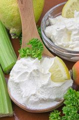 Sour cream closeup with fresh ingredients