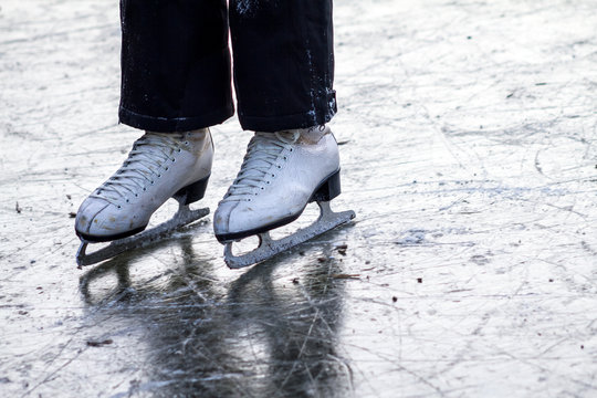 Ice skater on a frozen lake