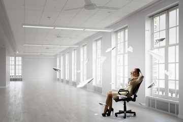 Fototapeta premium Lady boss in office chair . Mixed media