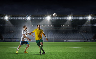 Soccer players fighting for ball . Mixed media