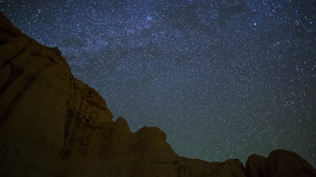 Astro Timelapse of Star Trails over Sandstone Canyon in Mojave Desert -Zooom In-