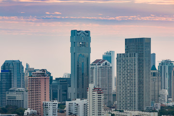 Office building with twilight sky background, Bangkok downtown Thailand