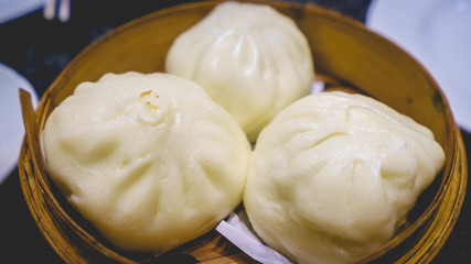 Steamed stuff bun ina basket, Dimsum