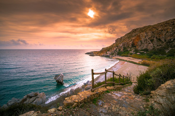 Panorama of Preveli beach at Libyan sea, river and palm forest, at sunset, southern Crete , Greece