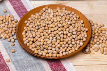 Soybeans over wooden table background