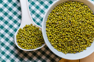 Green bean seed on table.