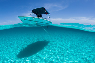Stationary boat on sea in sunshine, Staniel Cay, Bahamas, Caribbean 