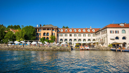 Fototapeta na wymiar Lakeside promenade at Orta, view from San Giulio island, Hotel san Rocco, Piedmont, Italy, Europe