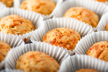  Homemade cheese muffins in paper cupcake cases. Shallow focus. close-up